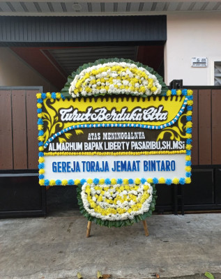 Papan Bunga Duka di Simpang Haru
